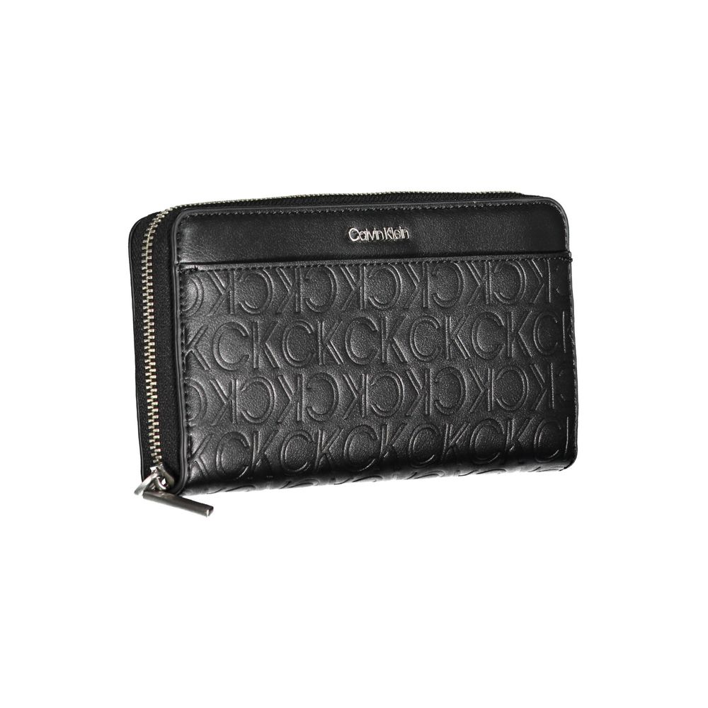 Black Polyethylene Women WalletUnveil the epitome of sophistication with this sleek Calvin Klein wallet, perfect for the modern trendsetter who values form and function. Boasting five compartments and double card slots, it’s a blend of style and security