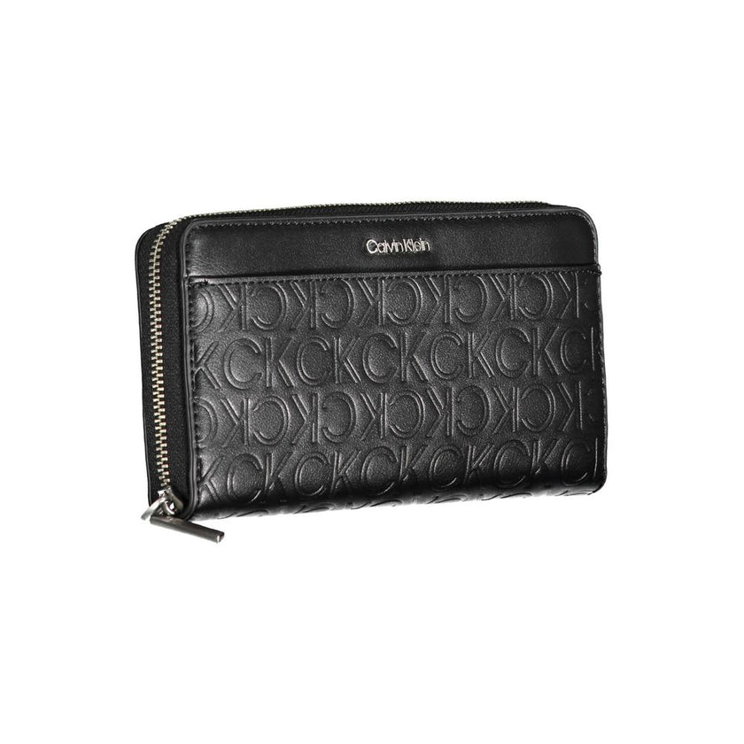 Black Polyethylene Women WalletUnveil the epitome of sophistication with this sleek Calvin Klein wallet, perfect for the modern trendsetter who values form and function. Boasting five compartments and double card slots, it’s a blend of style and security