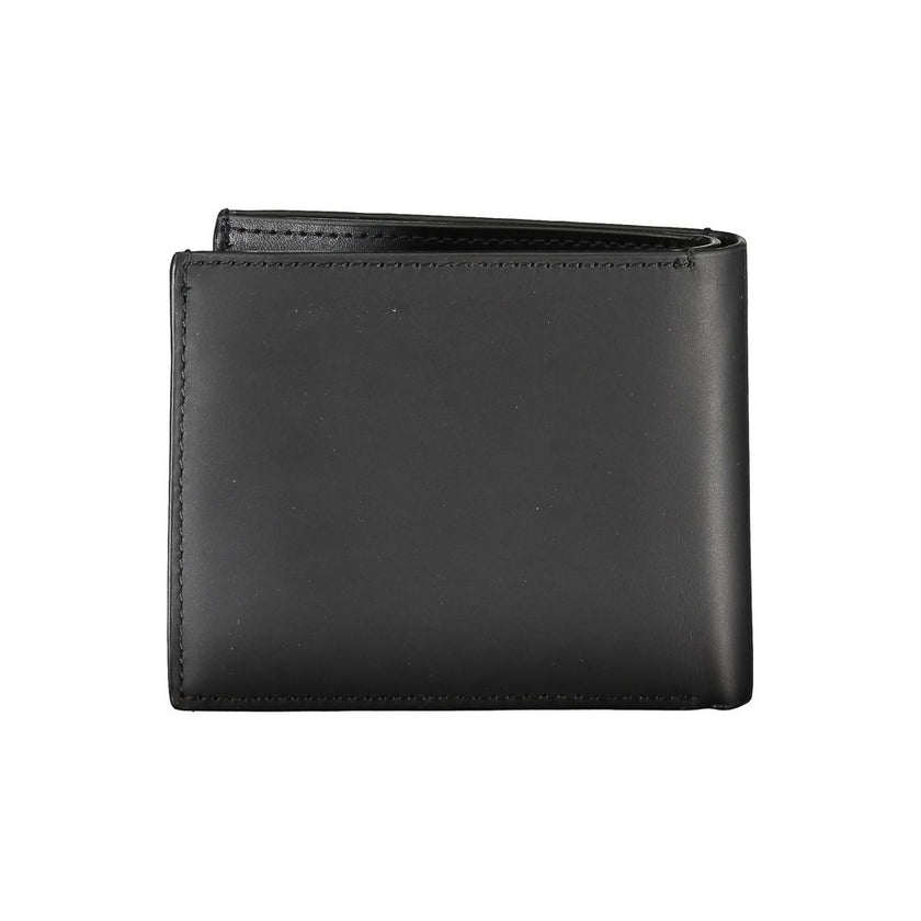 Black Leather RFID Wallet with Coin PurseEmbrace timeless elegance and functionality with the Calvin Klein black leather wallet, the perfect accessory for the discerning gentleman. This sleek wallet features two spacious compartments, a convenient coin pu