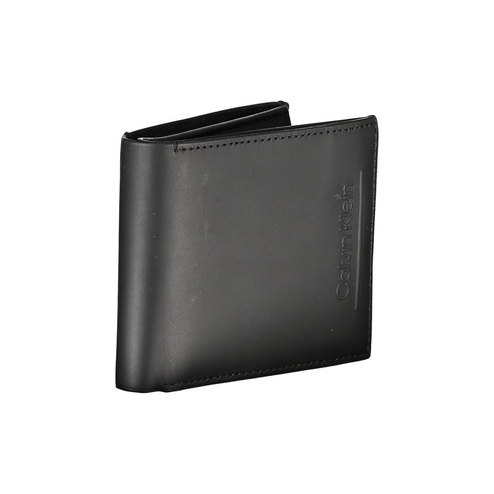 Black Leather RFID Wallet with Coin PurseEmbrace timeless elegance and functionality with the Calvin Klein black leather wallet, the perfect accessory for the discerning gentleman. This sleek wallet features two spacious compartments, a convenient coin pu