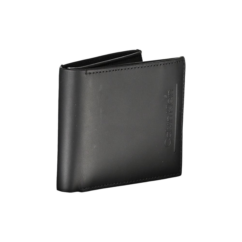 Black Leather RFID Wallet with Coin PurseEmbrace timeless elegance and functionality with the Calvin Klein black leather wallet, the perfect accessory for the discerning gentleman. This sleek wallet features two spacious compartments, a convenient coin pu