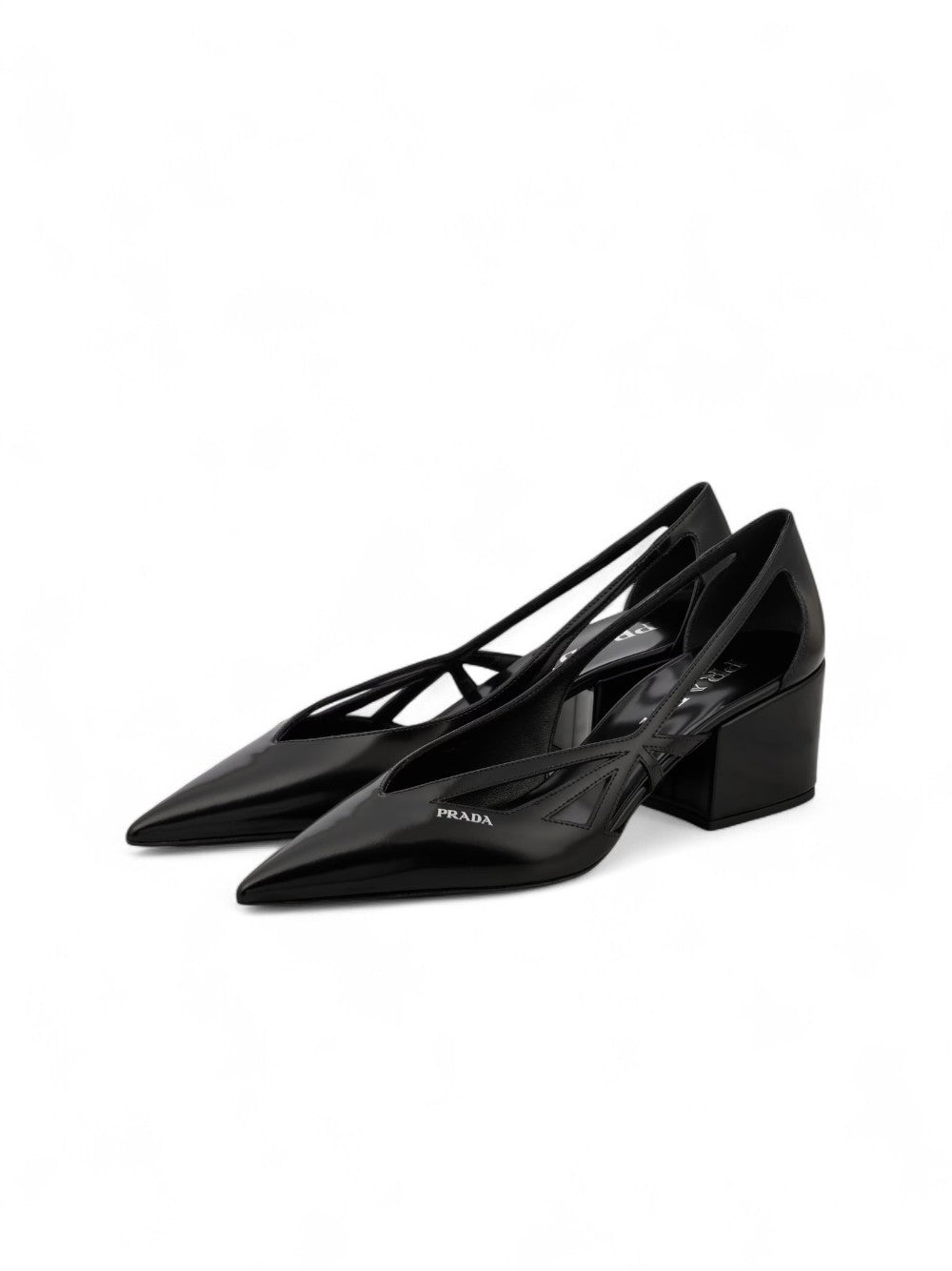 Black Leather Cut-Out Pumps 55PRADA Gorgeous brand new with tags, Satin And Metallic Leather Pumps Model: 1I741N1FDB55 Color: Black Material: Leather Leather upper , Leather lining , Leather insole , Rubber sole , Tapered toe cap, Brand logo Heel : 55 mm