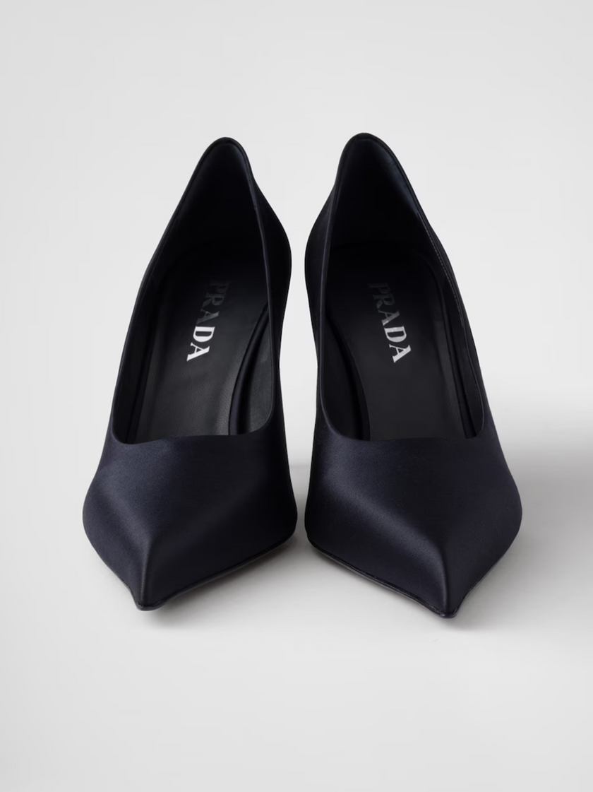 Blue Satin PumpsPRADA Gorgeous brand new with tags, Blue Satin Pumps Model: 1I484N_049_F0008_F_A085 Color: Blue Material: Viscose silk Leather and rubber sole with metal lettering logo Heel : Satin wrapped heel, 85 mm high Made in ItalyBlue Satin Pumps${t