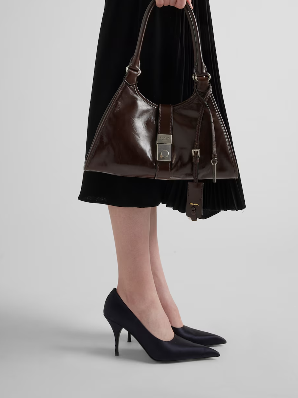 Blue Satin PumpsPRADA Gorgeous brand new with tags, Blue Satin Pumps Model: 1I484N_049_F0008_F_A085 Color: Blue Material: Viscose silk Leather and rubber sole with metal lettering logo Heel : Satin wrapped heel, 85 mm high Made in ItalyBlue Satin Pumps${t