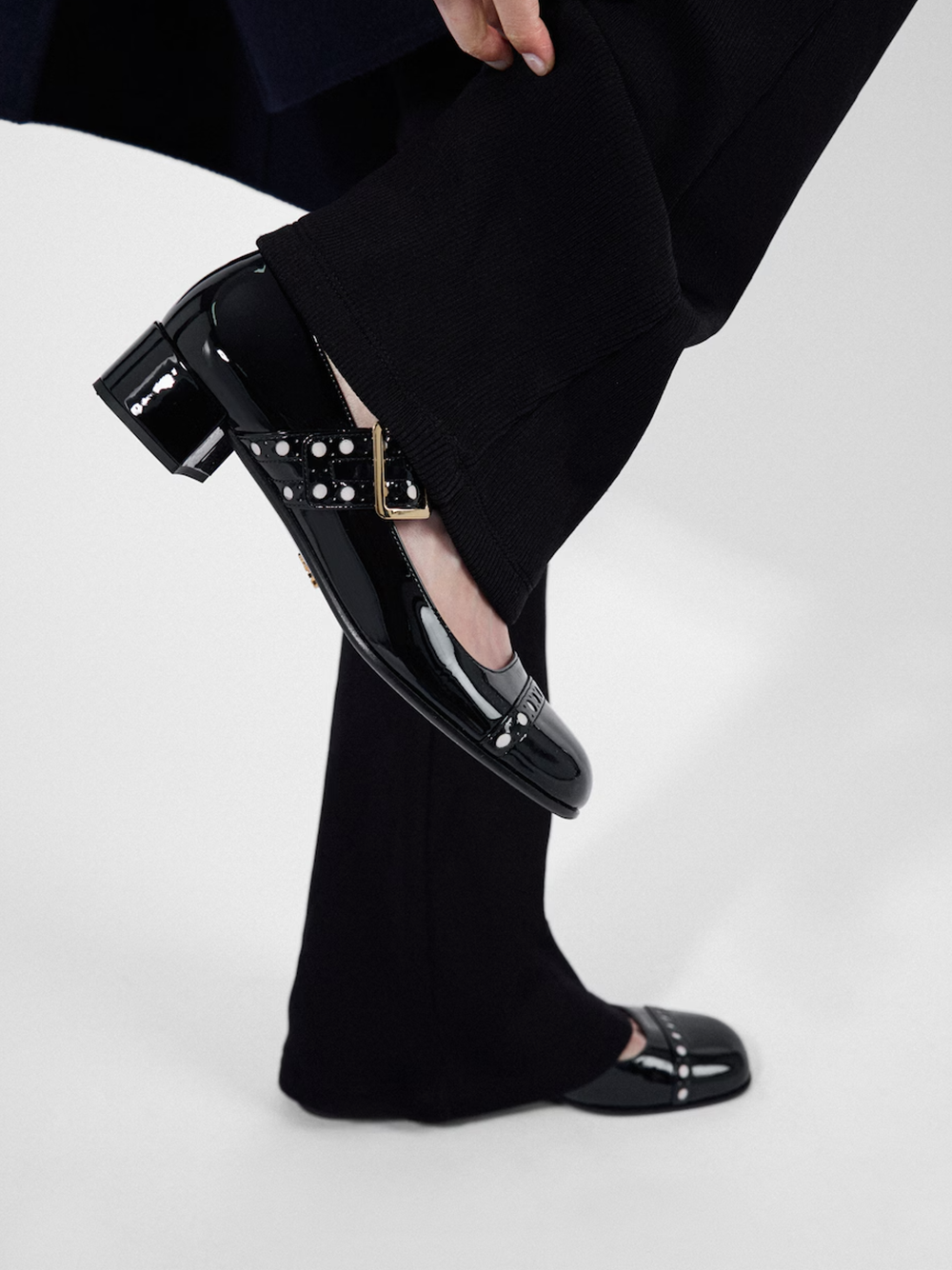 Black Patent leather Mary Jane pumpsPRADA Gorgeous brand new with tags, Black Patent leather Mary Jane pumps Model: 1I816N_069_F0002_F_035 Color: Black Material: 100% CalfskinUpper with perforations and metal buckle Screen-printed logo Leather and rubber