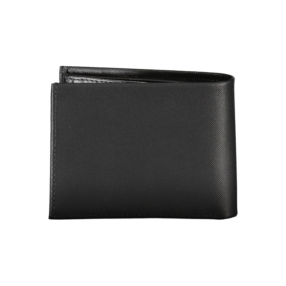 Elegant Black Leather Wallet with RFID BlockingStep up your accessory game with the sleek and practical Calvin Klein black leather wallet. This premium wallet features two compartments for currency, a secure coin purse, and dual card spaces to keep your e