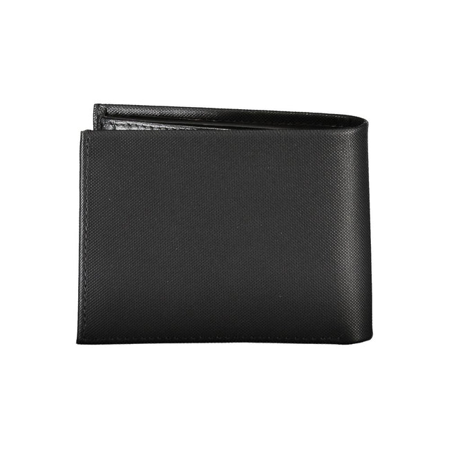 Elegant Black Leather Wallet with RFID BlockingStep up your accessory game with the sleek and practical Calvin Klein black leather wallet. This premium wallet features two compartments for currency, a secure coin purse, and dual card spaces to keep your e
