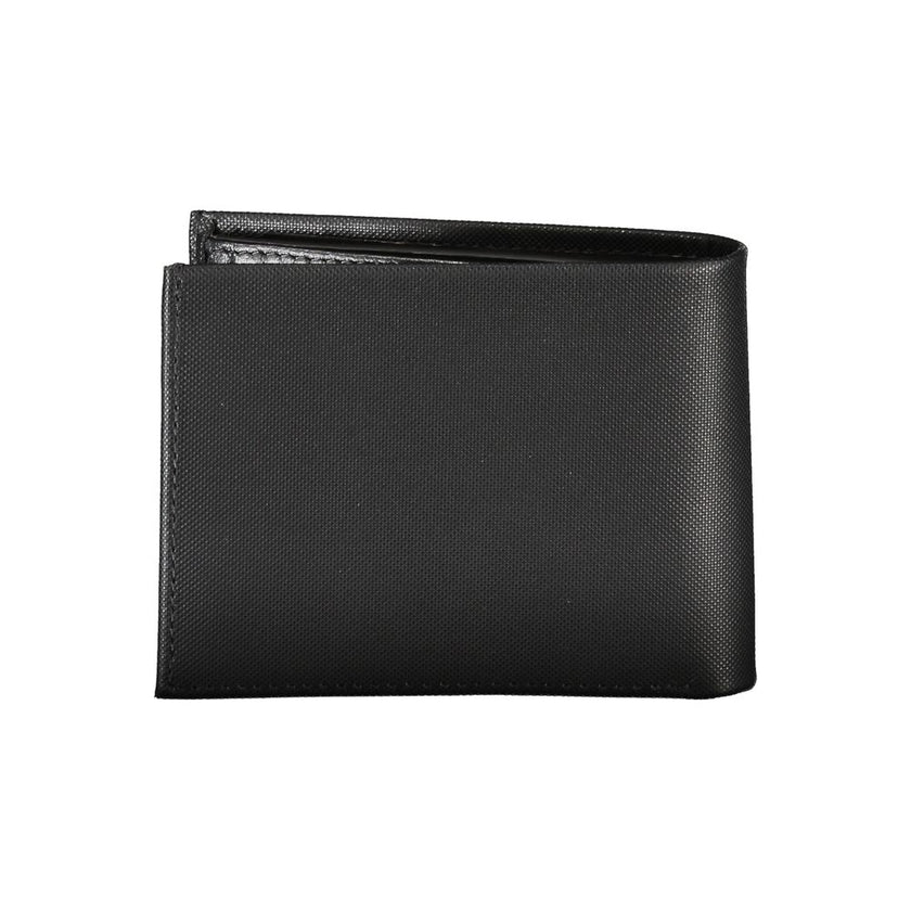 Elegant Black Leather Wallet with RFID BlockingStep up your accessory game with the sleek and practical Calvin Klein black leather wallet. This premium wallet features two compartments for currency, a secure coin purse, and dual card spaces to keep your e