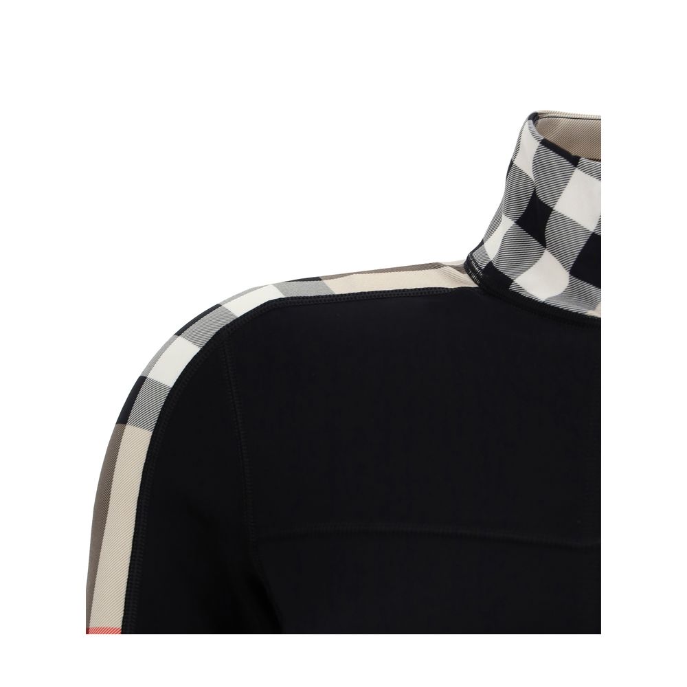 Black Elastane SweatshirtCynthia Sweatshirt by Burberry, cropped turtleneck design, front zipper closure, stretch design, bands with the brand’s iconic Archivio Check pattern, slim fit. Season: AW25 Composition: 14% Elastane 86% Polyamide MADE IN PORTUGAL