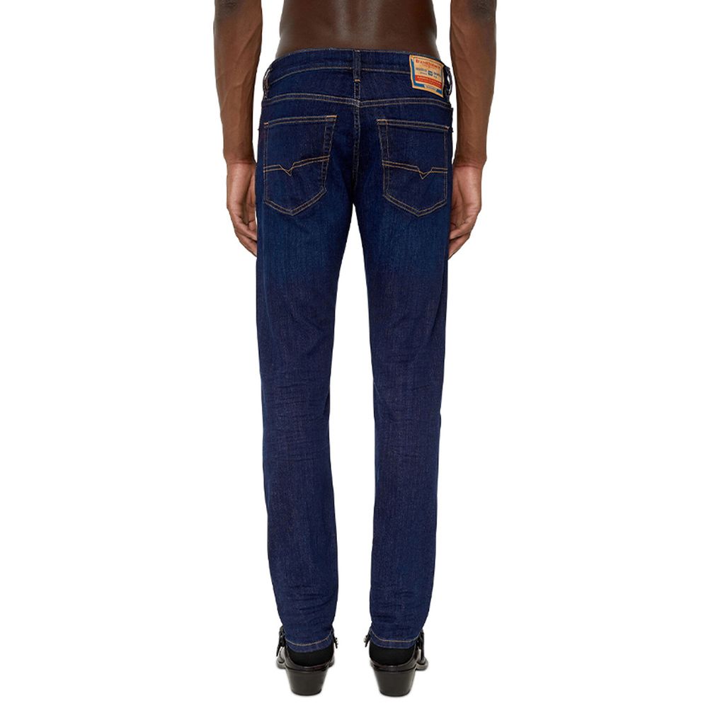 Blue Cotton Men JeansElevate your denim game with these Diesel slim-fit jeans, meticulously crafted for the modern trendsetter. Boasting a dark blue hue, these jeans blend classic cotton comfort with a touch of elastane for that perfect stretch. Equipped