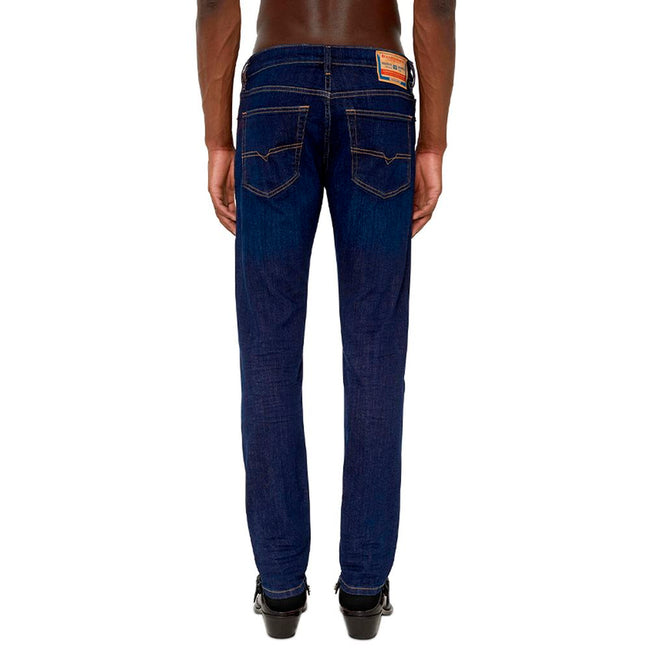 Blue Cotton Men JeansElevate your denim game with these Diesel slim-fit jeans, meticulously crafted for the modern trendsetter. Boasting a dark blue hue, these jeans blend classic cotton comfort with a touch of elastane for that perfect stretch. Equipped