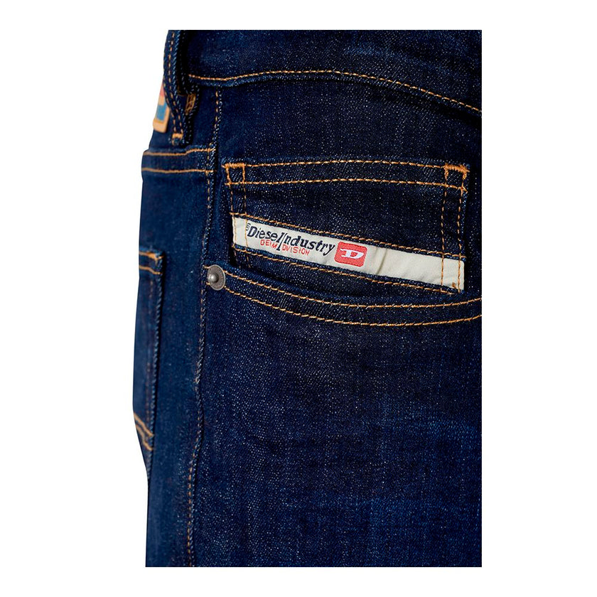 Blue Cotton Men JeansElevate your denim game with these Diesel slim-fit jeans, meticulously crafted for the modern trendsetter. Boasting a dark blue hue, these jeans blend classic cotton comfort with a touch of elastane for that perfect stretch. Equipped