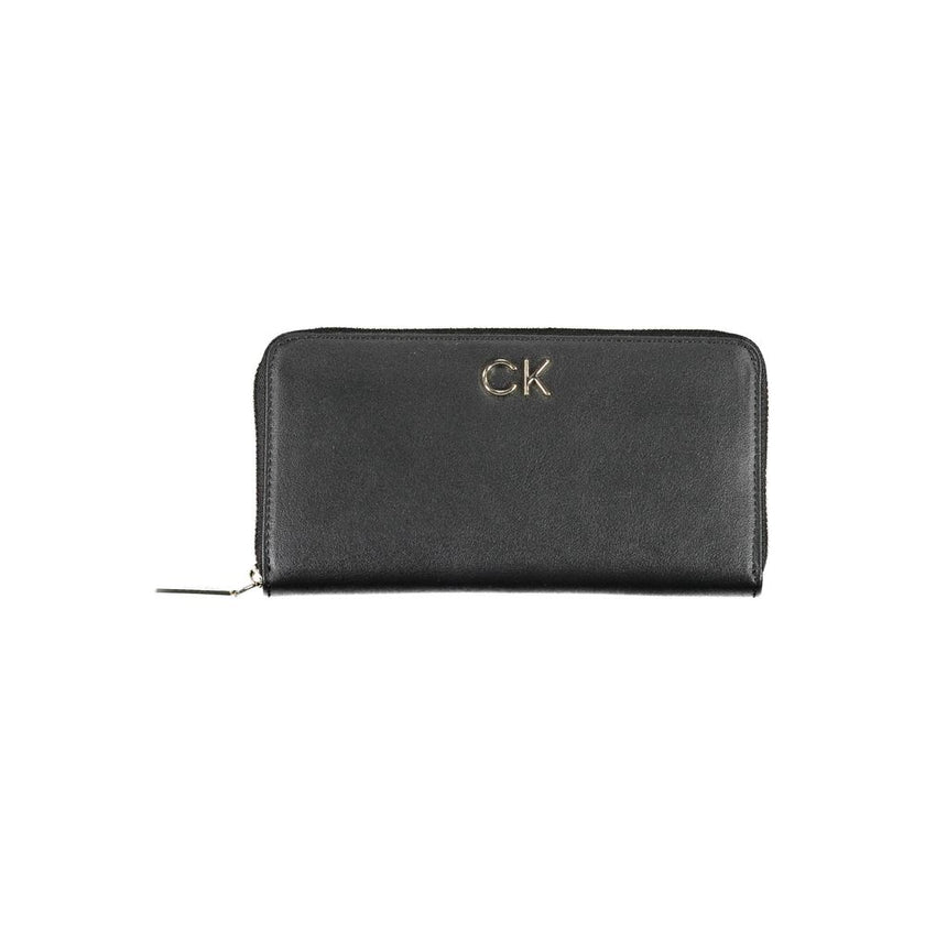Black Polyethylene Women WalletDiscover the epitome of sophistication with this sleek Calvin Klein wallet. Designed for the modern trendsetter, it boasts five practical compartments, including dedicated card spaces, ensuring your essentials are organized