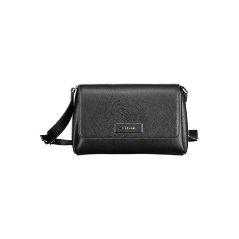 Black Polyester Women HandbagDare to make a sustainable statement with the Calvin Klein handbag, where eco-conscious fashion meets sleek design. Crafted from a blend of recycled materials, this bag features an adjustable shoulder trap for versatile carry,
