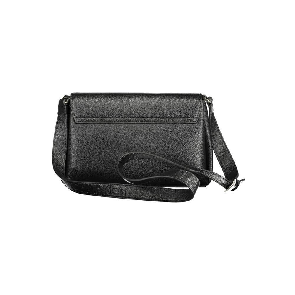 Black Polyester Women HandbagDare to make a sustainable statement with the Calvin Klein handbag, where eco-conscious fashion meets sleek design. Crafted from a blend of recycled materials, this bag features an adjustable shoulder trap for versatile carry,