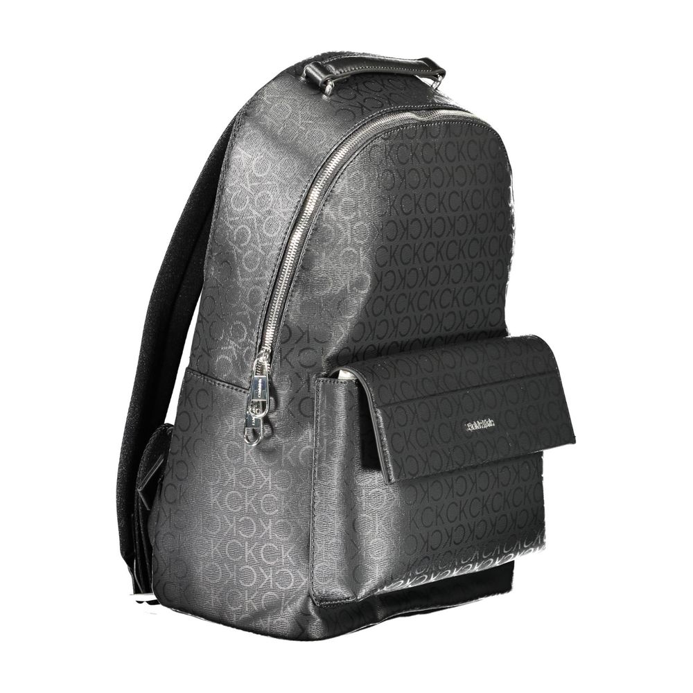 Black Polyester Men BackpackDiscover the epitome of urban sophistication with the Calvin Klein backpack. Crafted for the modern trendsetter, this sleek accessory boasts practicality without compromising on style. Its adjustable straps offer custom comfort