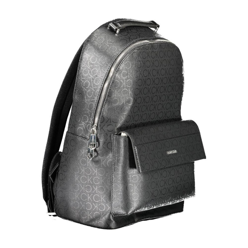 Black Polyester Men BackpackDiscover the epitome of urban sophistication with the Calvin Klein backpack. Crafted for the modern trendsetter, this sleek accessory boasts practicality without compromising on style. Its adjustable straps offer custom comfort