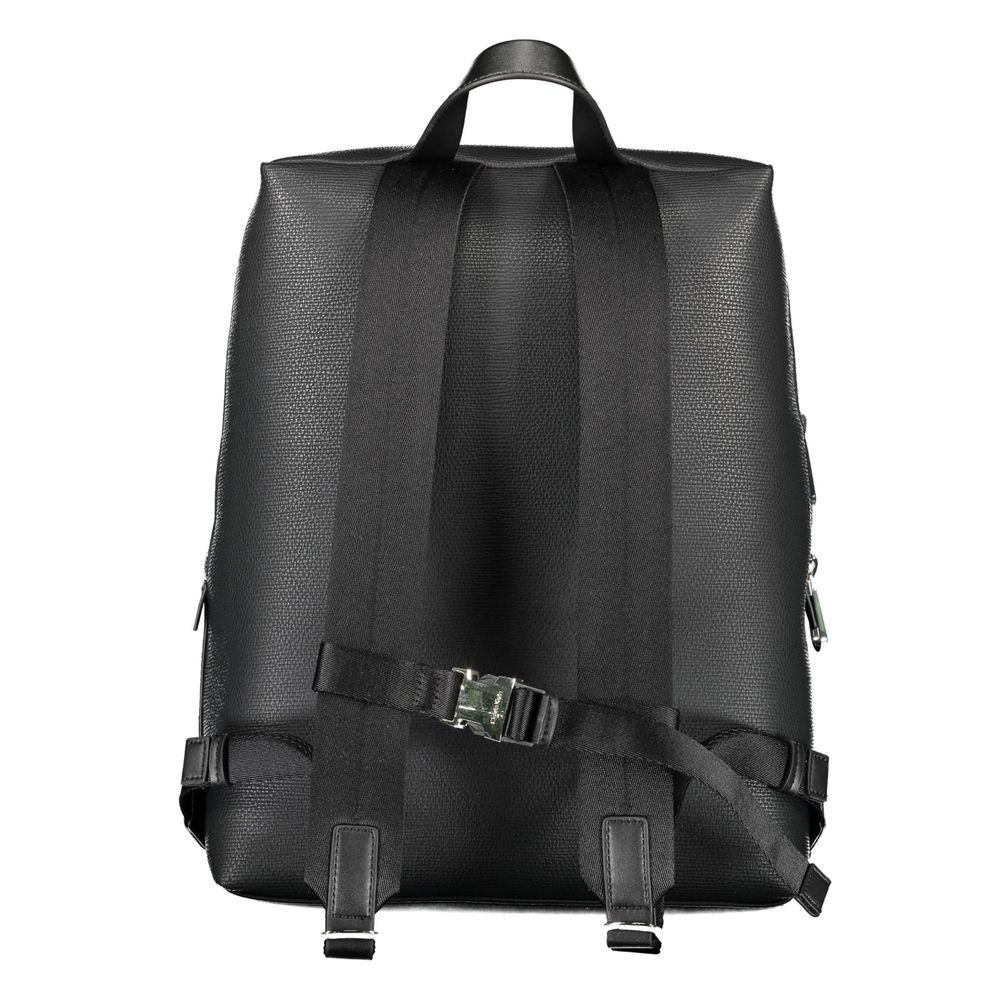 Black Polyester Men BackpackDiscover the epitome of urban sophistication with the Calvin Klein backpack, where functionality meets eco-conscious fashion. This sleek accessory boasts adjustable straps for tailor-made comfort, a convenient external pocket f