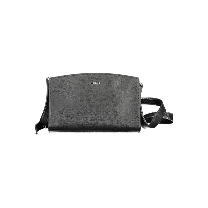 Black Polyester Women HandbagElevate your accessory game with the sleek sophistication of Calvin Klein’s must-have shoulder bag. Boasting an adjustable strap for personalized comfort, this chic piece features a secure zip closure to safeguard your essenti