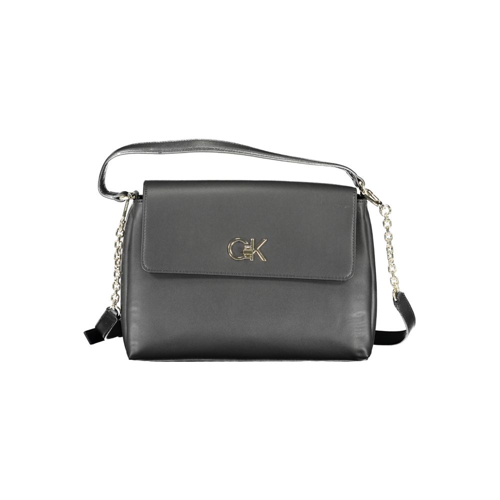 Black Polyester Women HandbagExperience the fusion of eco-conscious design and statement style with this Calvin Klein masterpiece. Its black hue exudes timeless elegance, while the contrasting details provide a touch of modern edge. With dual compartments