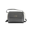 Black Polyester Women HandbagExperience the fusion of eco-conscious design and statement style with this Calvin Klein masterpiece. Its black hue exudes timeless elegance, while the contrasting details provide a touch of modern edge. With dual compartments