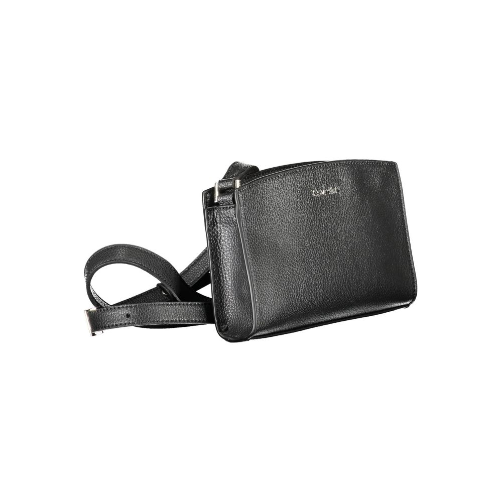 Black Polyester Women HandbagElevate your accessory game with the sleek sophistication of Calvin Klein’s must-have shoulder bag. Boasting an adjustable strap for personalized comfort, this chic piece features a secure zip closure to safeguard your essenti