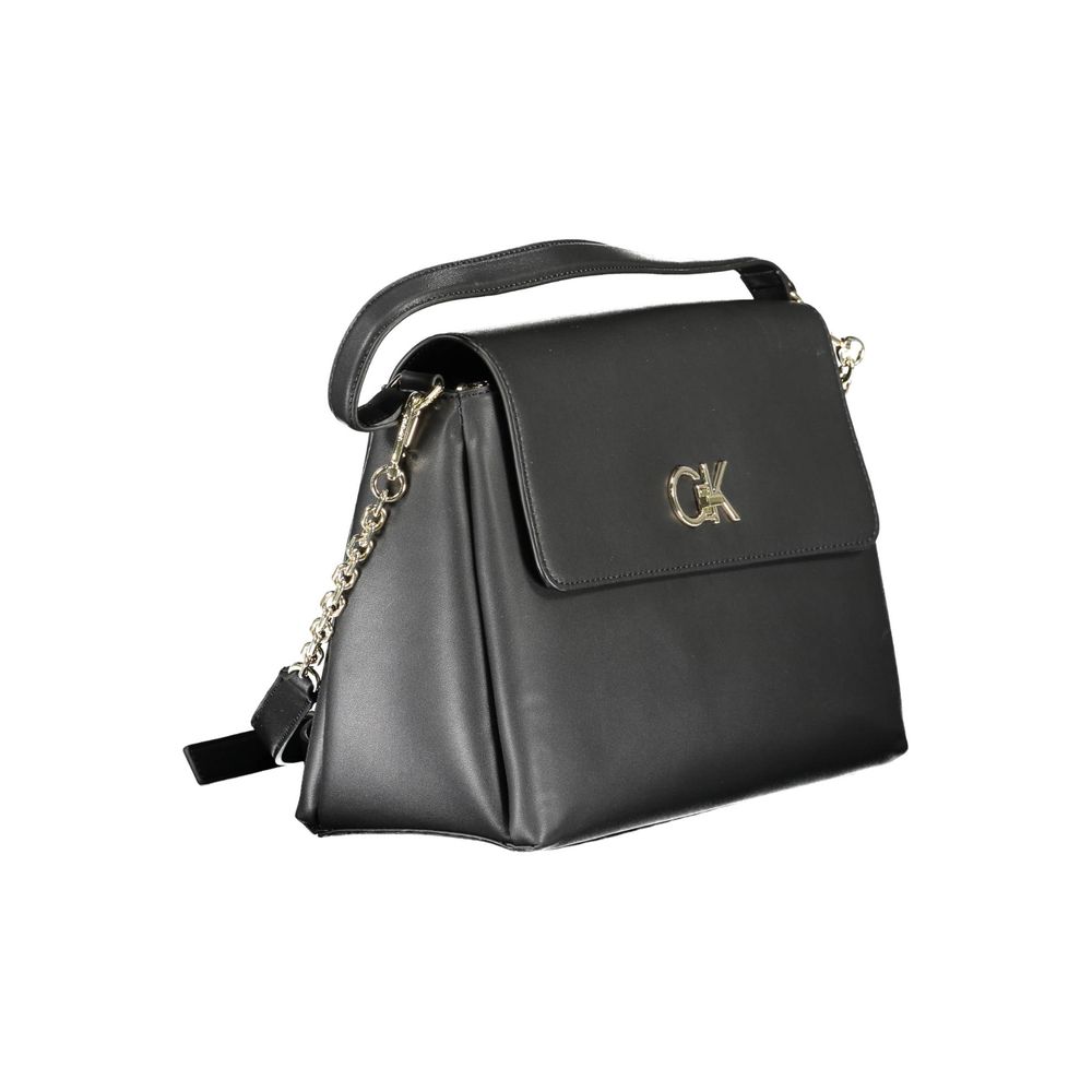 Black Polyester Women HandbagExperience the fusion of eco-conscious design and statement style with this Calvin Klein masterpiece. Its black hue exudes timeless elegance, while the contrasting details provide a touch of modern edge. With dual compartments