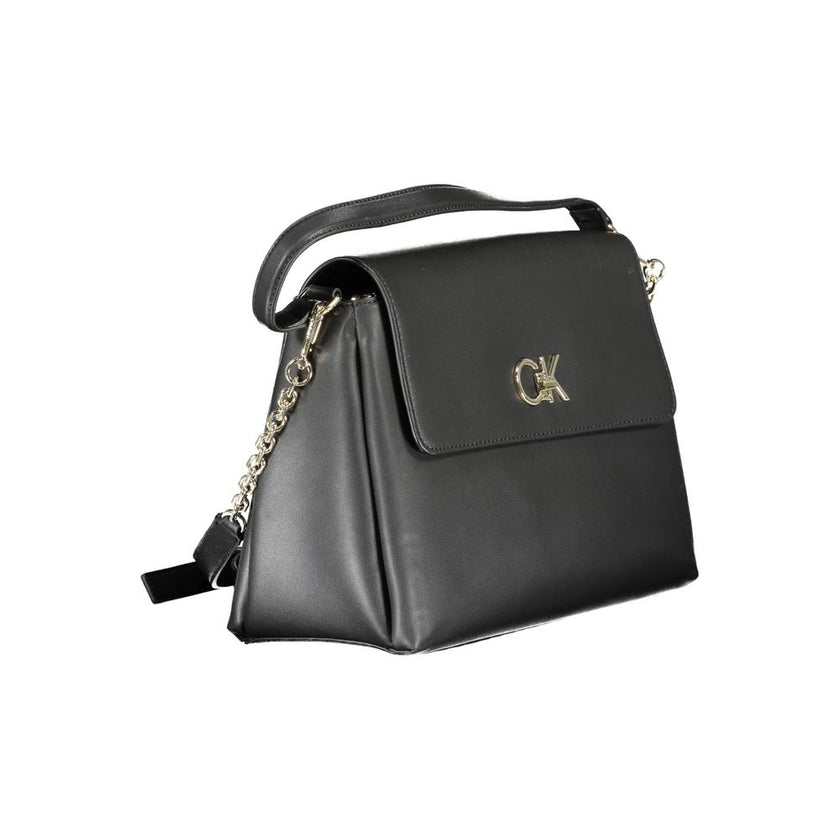 Black Polyester Women HandbagExperience the fusion of eco-conscious design and statement style with this Calvin Klein masterpiece. Its black hue exudes timeless elegance, while the contrasting details provide a touch of modern edge. With dual compartments