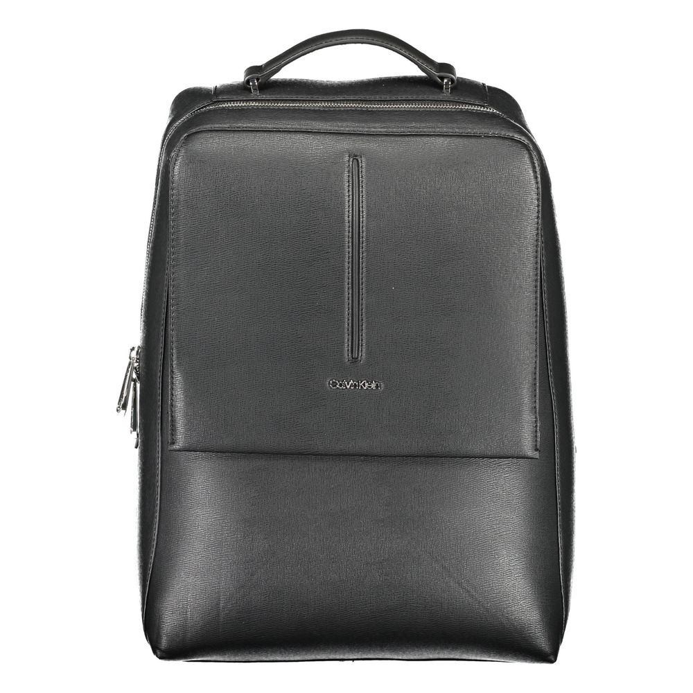 Black Polyester Men BackpackDiscover the epitome of urban sophistication with this Calvin Klein backpack. Crafted with a conscientious approach to fashion, it boasts a sleek black finish complemented by contrasting details, offering a bold statement piece