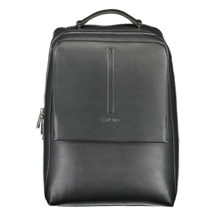 Black Polyester Men BackpackDiscover the epitome of urban sophistication with this Calvin Klein backpack. Crafted with a conscientious approach to fashion, it boasts a sleek black finish complemented by contrasting details, offering a bold statement piece