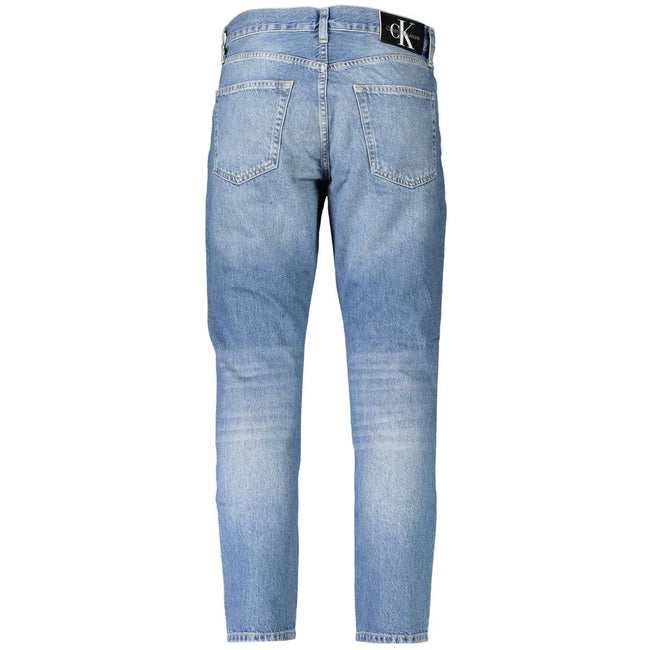 Blue Cotton Men JeansElevate your denim game with these Calvin Klein jeans, where style meets comfort. Featuring a subtle washed effect and classic 5-pocket construction, this pair is a testament to timeless fashion. The iconic Calvin Klein logo adds a to