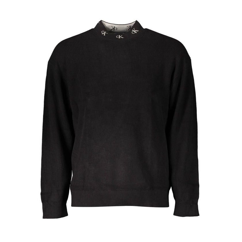 Black Cotton Men SweaterElevate your style with a touch of Calvin Klein sophistication. This sleek black sweater boasts long sleeves, a comfortable round neck, and is adorning with intricate embroidery featuring the iconic Calvin Klein logo. Crafted from