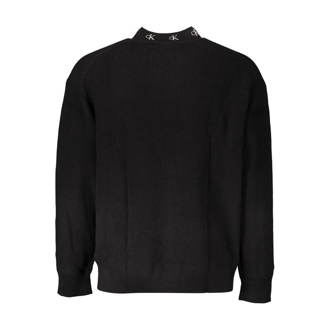 Black Cotton Men SweaterElevate your style with a touch of Calvin Klein sophistication. This sleek black sweater boasts long sleeves, a comfortable round neck, and is adorning with intricate embroidery featuring the iconic Calvin Klein logo. Crafted from
