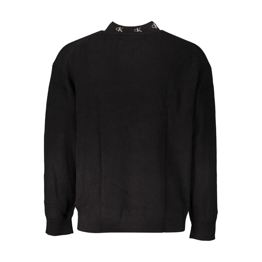 Black Cotton Men SweaterElevate your style with a touch of Calvin Klein sophistication. This sleek black sweater boasts long sleeves, a comfortable round neck, and is adorning with intricate embroidery featuring the iconic Calvin Klein logo. Crafted from