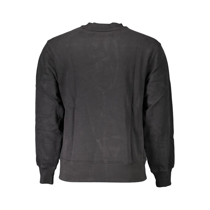 Black Cotton Men SweaterDiscover the epitome of contemporary sophistication with this Calvin Klein sweatshirt. Boasting a refined, long-sleeved design, this piece exudes a polished casual charm with its iconic logo print front and center. Crafted from pur