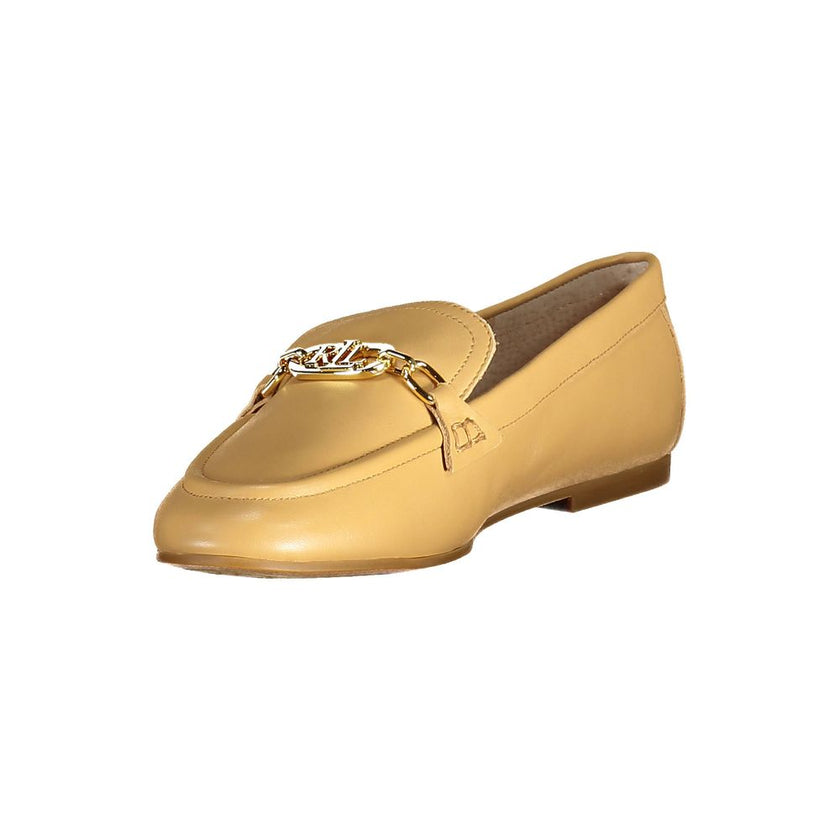 Beige Leather Women Flat ShoeEmbrace the epitome of preppy chic with these classic Ralph Lauren moccasins, showcasing the brand’s iconic logo. Crafted with luxurious leather and meticulous attention to detail, they infuse everyday elegance into your wardr