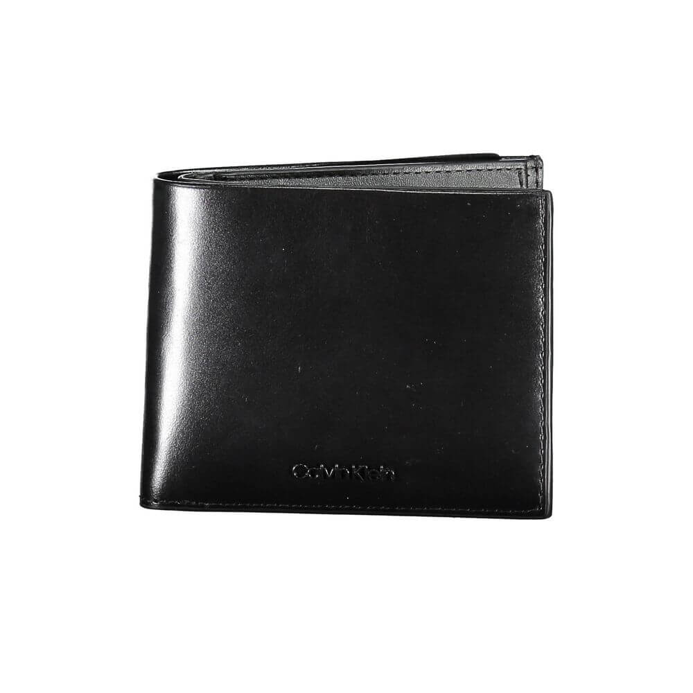 Black Leather Men WalletExperience the epitome of luxury with this sleek Calvin Klein wallet, designed for the modern man. Crafted from premium 100% leather, it boasts a sophisticated black hue that exudes timeless elegance. The practical design features