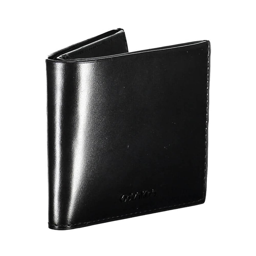 Black Leather Men WalletExperience the epitome of luxury with this sleek Calvin Klein wallet, designed for the modern man. Crafted from premium 100% leather, it boasts a sophisticated black hue that exudes timeless elegance. The practical design features