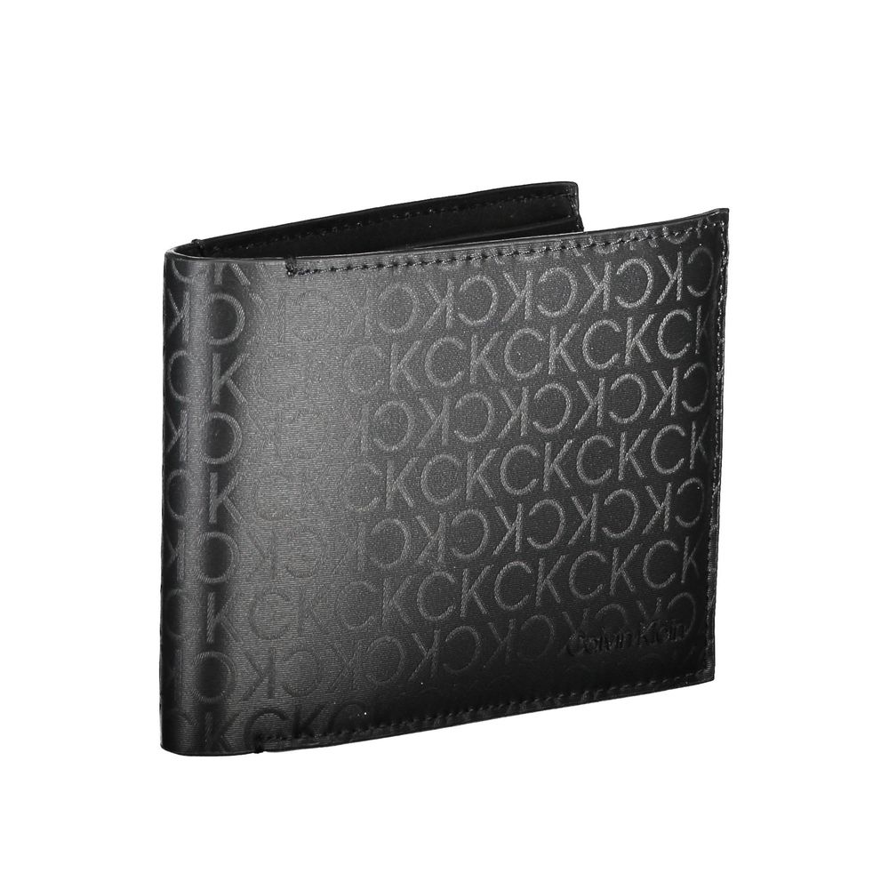 Black Polyester Men WalletInfuse your everyday style with a touch of sophistication with this Calvin Klein wallet. Crafted to keep your essentials secure and organized, it features two compartments, a coin purse, and ample space for your cards enhanced wi