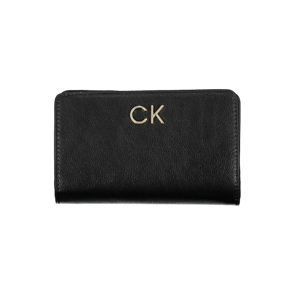 Black Polyethylene Women WalletIndulge in the epitome of sophistication with the Calvin Klein wallet. Perfectly blending functionality with chic elegance, this wallet features a singular main compartment, dual internal card spaces, and a secure purse area