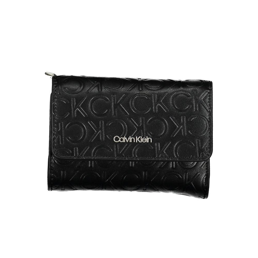Black Polyethylene Women WalletIndulge in the seamless blend of functionality and style with this Calvin Klein wallet. Crafted to perfection, the accessory boasts two ample compartments, a coin purse, and double spaces to stow away cards with ease. The co
