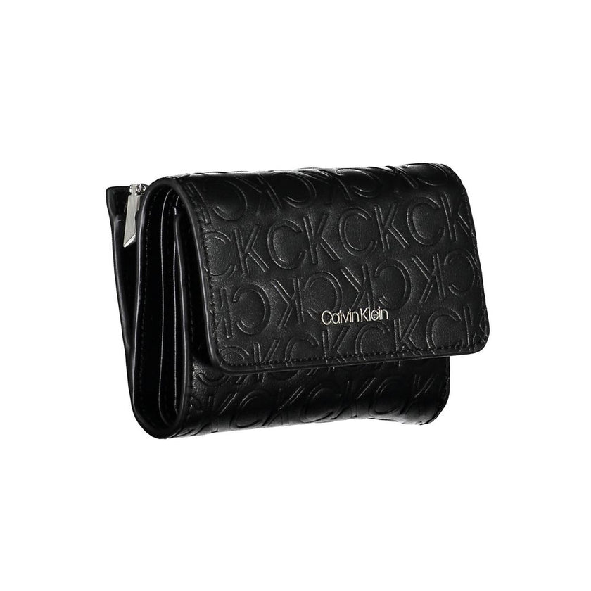 Black Polyethylene Women WalletIndulge in the seamless blend of functionality and style with this Calvin Klein wallet. Crafted to perfection, the accessory boasts two ample compartments, a coin purse, and double spaces to stow away cards with ease. The co