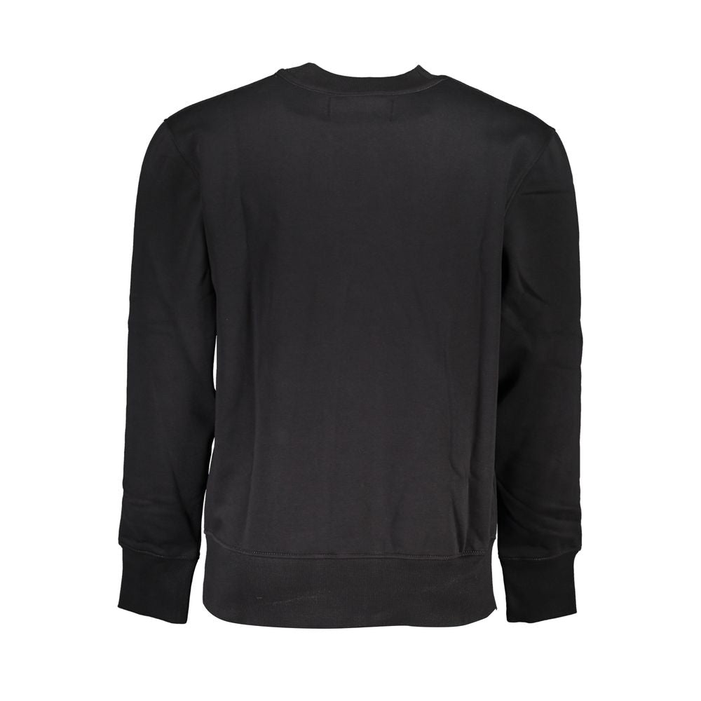Black Cotton Men SweaterStep into the epitome of urban cool with this Calvin Klein long sleeve sweatshirt. Crafted for the modern man, this piece is a symphony of comfort meets style. With a plush fleece interior for those cooler days and a bold embroider