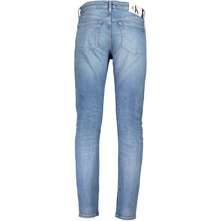Blue Cotton Men JeansElevate your denim game with these Calvin Klein slim tapered jeans. Boasting a modern washed effect for a touch of edge and crafted with a touch of elastane for that perfect fit, they surmise a blend of style and comfort. A subtle log
