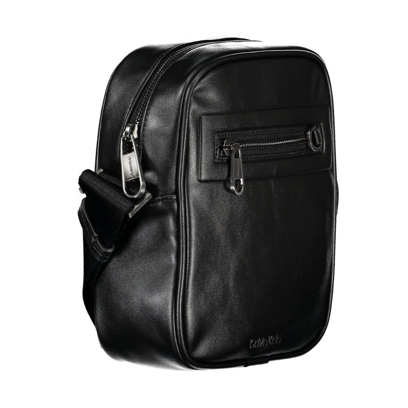 Sleek Urban Black Shoulder BagUpgrade your accessory game with this sleek, environmentally conscious shoulder bag from Calvin Klein. Its refined design boasts an adjustable shoulder strap for a customized fit, and the contrasting details add a touch of el