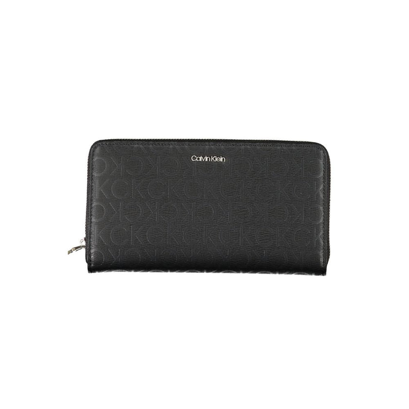 Sleek Designer Three-Compartment WalletImmerse in sophistication with this sleek wallet from Calvin Klein, crafted for the modern individual. Staying organized is effortless with three well-designed compartments, complemented by a handy coin purse and ded