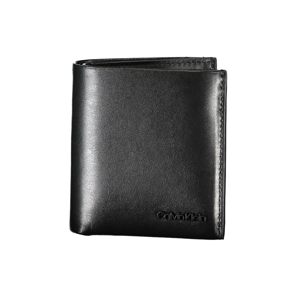 Sleek Black Leather RFID WalletExperience unparalleled sophistication with the Calvin Klein wallet, crafted for the modern man. This sleek accessory features two roomy compartments, a convenient coin purse, and double card-holder spaces. Enhanced with RFI