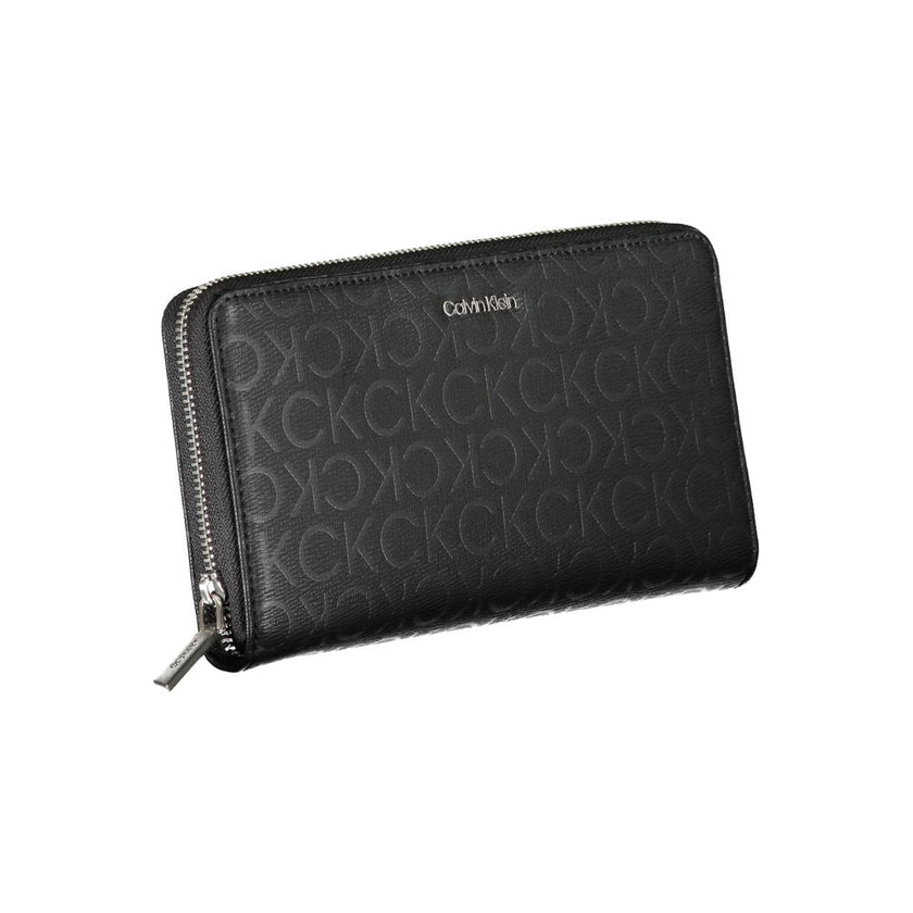 Sleek Designer Three-Compartment WalletImmerse in sophistication with this sleek wallet from Calvin Klein, crafted for the modern individual. Staying organized is effortless with three well-designed compartments, complemented by a handy coin purse and ded