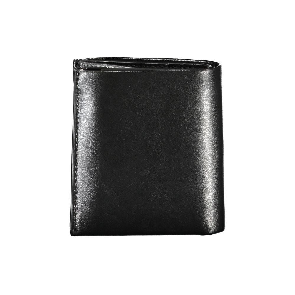 Sleek Black Leather RFID WalletExperience unparalleled sophistication with the Calvin Klein wallet, crafted for the modern man. This sleek accessory features two roomy compartments, a convenient coin purse, and double card-holder spaces. Enhanced with RFI