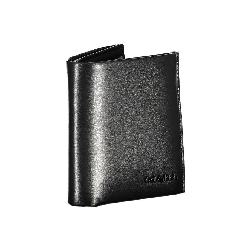 Sleek Black Leather RFID WalletExperience unparalleled sophistication with the Calvin Klein wallet, crafted for the modern man. This sleek accessory features two roomy compartments, a convenient coin purse, and double card-holder spaces. Enhanced with RFI